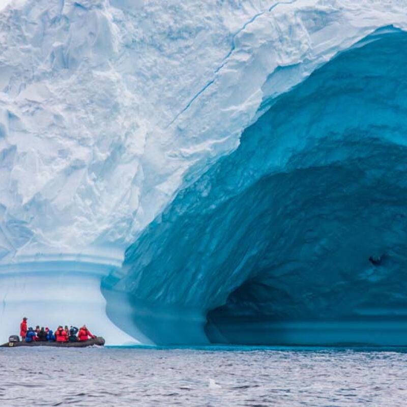 Ice cave in Iceberg Alley on Antarctica yacht charter