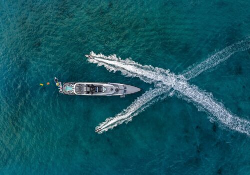 Aerial profile of OKTO 218 foot ISA yacht for charter.